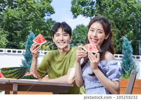 summer lifestyle, korean asian young couple with watermelon 105258232