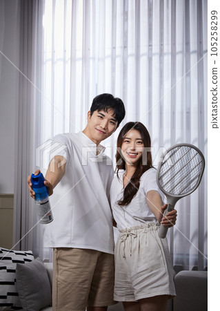summer lifestyle, korean asian young couple and kill bugs 105258299