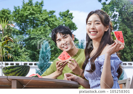 summer lifestyle, korean asian young couple with watermelon 105258301