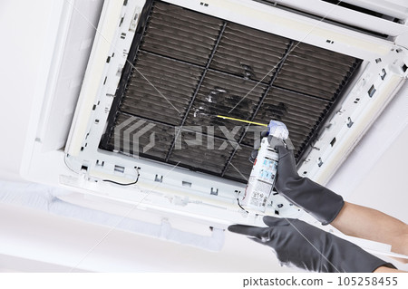 summer lifestyle, cleaning air conditioner 105258455