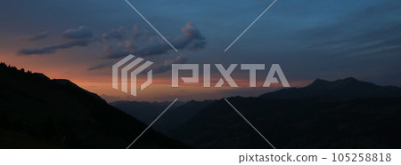 Nightfall over Gstaad, Swiss Alps. Nightfall over Gstaad, Swiss Alps. 105258818