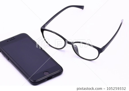 Image of eyeglasses (reading glasses and smartphone) 105259332