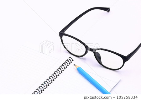 Image of glasses (reading glasses and notebook) 105259334