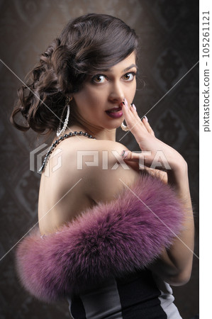 Retro woman portrait. Surprised gorgeous lady. Photo in vintage style from 20s or 30s. Old fashionable Finger Wave makeup and hairstyle. Retro woman portrait. Surprised gorgeous lady. Photo in vintage style from 20s or 30s. Old fashionable Finger Wave makeup and hairstyle. 105261121