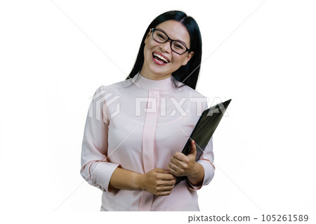 Young asian businesswoman with clipboard is laughing hard. Isolated on white. Young asian businesswoman with clipboard is laughing hard. Isolated on white. 105261589