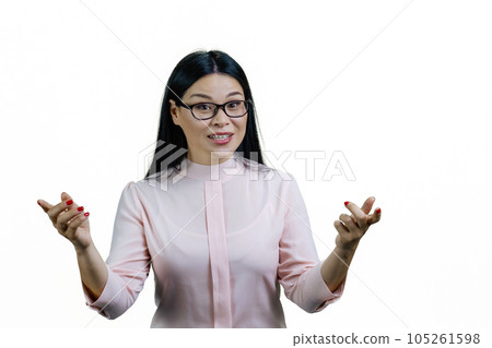 Smiling asian businesswoman is gesturing white giving a speech. Isolated on white background. 105261598