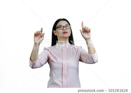 Young smart asian woman is using invisible virtual screen. Isolated on white background. Young smart asian woman is using invisible virtual screen. Isolated on white background. 105261626