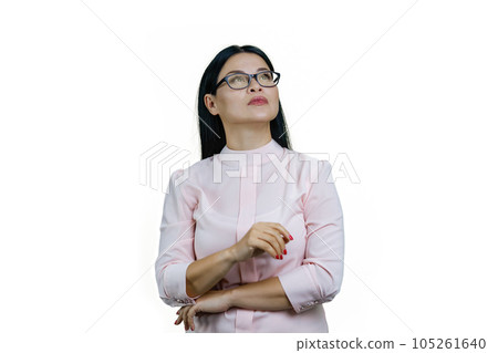 Portrait of smart thoughtful asian businesswoman is looking up. Isolated on white background. Portrait of smart thoughtful asian businesswoman is looking up. Isolated on white background. 105261640