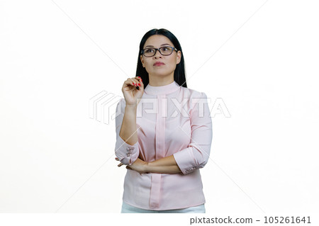Portrait of smart asian businesswoman thinking about something. Isolated on white background. Portrait of smart asian businesswoman thinking about something. Isolated on white background. 105261641