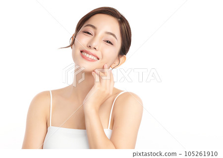 Beautiful young asian woman with clean fresh skin on white background, Face care, Facial treatment, Cosmetology, beauty and spa, Asian women portrait. Beautiful young asian woman with clean fresh skin on white background, Face care, Facial treatment, Cosmetology, beauty and spa, Asian women portrait. 105261910