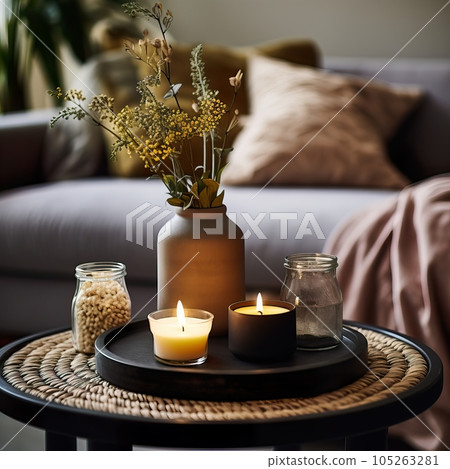 Warm cozy home interior with burning candles, afternoon room decoration, creative decor arrangement 105263281