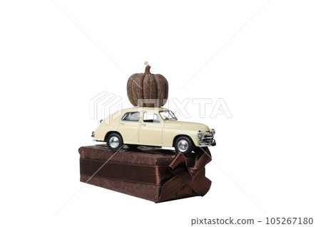 PNG, a toy car with a gift and a pumpkin on the roof, isolated on white background PNG, a toy car with a gift and a pumpkin on the roof, isolated on white background 105267180