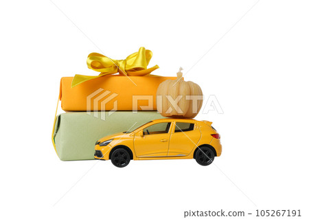PNG, a toy car with a gift and a pumpkin on the roof, isolated on white background PNG, a toy car with a gift and a pumpkin on the roof, isolated on white background 105267191