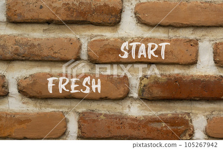 Fresh start and motivational symbol. Concept words Fresh start on beautiful red brown brick wall on beautiful red brown brick wall background. Business motivational and Fresh start concept. Copy space Fresh start and motivational symbol. Concept words Fresh start on beautiful red brown brick wall on beautiful red brown brick wall background. Business motivational and Fresh start concept. Copy space 105267942