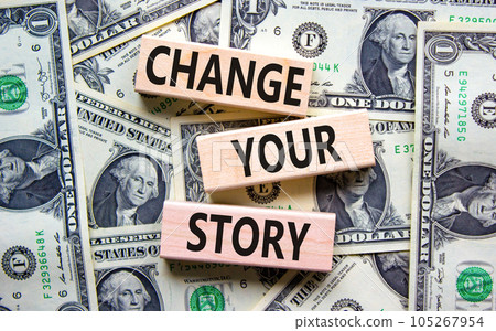 Change your story symbol. Concept words Change your story on wooden blocks on a beautiful background from dollar bills. Business finacial and change your story concept. Copy space. 105267954
