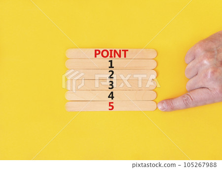 Time to point 5 symbol. Concept word Point 1 2 3 4 5 on wooden sticks. Businessman hand. Beautiful yellow table yellow background. Business planning and time to point 5 concept. Copy space. Time to point 5 symbol. Concept word Point 1 2 3 4 5 on wooden sticks. Businessman hand. Beautiful yellow table yellow background. Business planning and time to point 5 concept. Copy space. 105267988