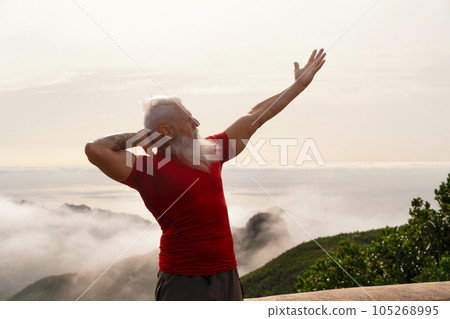 Senior man doing sport exercises Senior man doing sport exercises 105268995