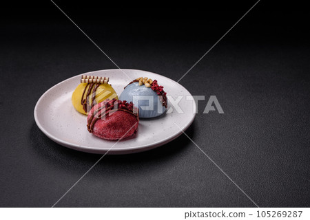 Delicious sweet colorful mochi desserts or ice cream with rice dough and toppings 105269287