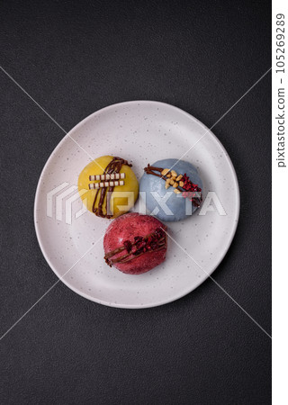 Delicious sweet colorful mochi desserts or ice cream with rice dough and toppings 105269289