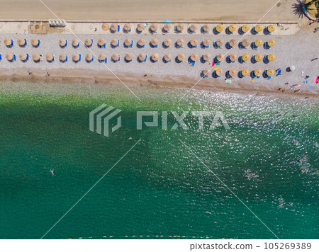 Aerial photographs. View from flying drone. Birds-eye view of beach in Montenegro. Top view Aerial photographs. View from flying drone. Birds-eye view of beach in Montenegro. Top view 105269389