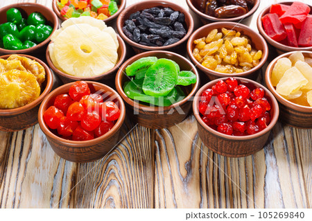 Group of dried and candied fruit in bowl Group of dried and candied fruit in bowl 105269840