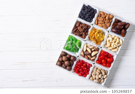 Mix of dried and candied fruits and nuts 105269857