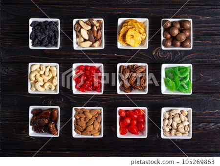 Mix of dried and candied fruits and nuts 105269863