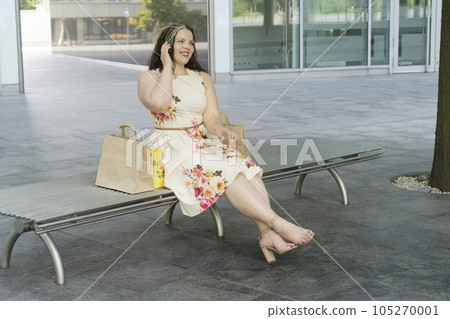 Happy woman shopping Happy woman shopping 105270001