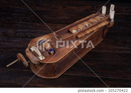 The Hurdy-gurdy, stringed musical instrument. The Hurdy-gurdy, stringed musical instrument. 105270422