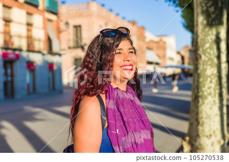 Plaza de Cervantes in Alcala de Henares tourism heritage. Hispanic mid-female journey confident Plaza de Cervantes in Alcala de Henares tourism heritage. Hispanic mid-female journey confident 105270538
