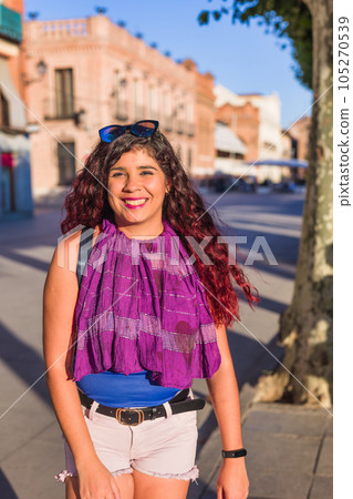 Plaza de Cervantes in Alcala de Henares tourism heritage. Hispanic mid-female journey confident Plaza de Cervantes in Alcala de Henares tourism heritage. Hispanic mid-female journey confident 105270539