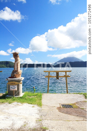 Lake Ikeda seen from the Koheta Observatory with a golden torii gate Lake Ikeda seen from the Koheta Observatory with a golden torii gate 105271496