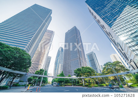 "Tokyo" The scenery of Shinjuku looking up at the blue sky and skyscrapers "Tokyo" The scenery of Shinjuku looking up at the blue sky and skyscrapers 105271628