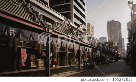 Tsukishima shopping street illuminated by the warm afternoon sun Tsukishima shopping street illuminated by the warm afternoon sun 105272035