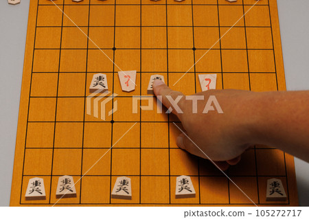 Scissors shogi playing with shogi pieces 105272717