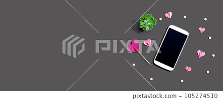 Smartphone with hearts and a succulent 105274510