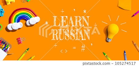 Learn Russian theme with school supplies - flat lay Learn Russian theme with school supplies - flat lay 105274517