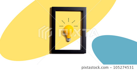 Yellow light bulb inside a frame - inspiration, creativity themes Yellow light bulb inside a frame - inspiration, creativity themes 105274531