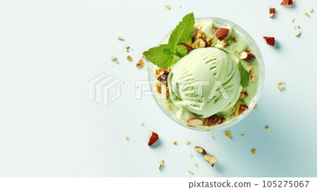 Advertising shot, green nut ice cream ball with pistachios in a cup, top view, isolated on light green background. High quality illustration 105275067
