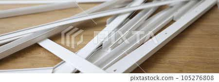 Plastic white plinth on a brown floor, set 105276808