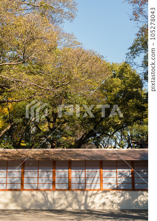 Atsuta Shrine traditional wall with green tree in Nagoya, Japan 105278043