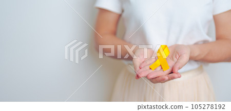 Yellow September, Suicide prevention day, Childhood, Sarcoma, bone and bladder cancer Awareness month, Yellow Ribbon for supporting people life and illness. Healthcare and World cancer day concept Yellow September, Suicide prevention day, Childhood, Sarcoma, bone and bladder cancer Awareness month, Yellow Ribbon for supporting people life and illness. Healthcare and World cancer day concept 105278192
