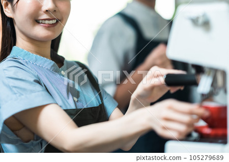 Young woman brewing espresso Faceless 105279689