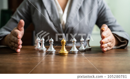 Chess leader and team. Human resources concept career management with clasped hands planning strategy with chess figures. leadership or success teamwork. Inspiration idea of goal 105280781