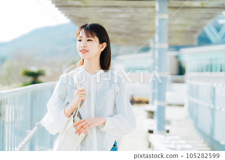 College student walking on campus College student walking on campus 105282599