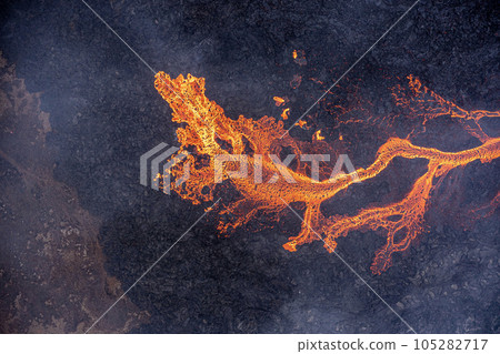 Aerial view of spreading melted lava from volcano. Aerial view of spreading melted lava from volcano. 105282717