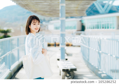 College student walking on campus 105286252