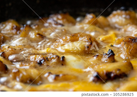 Yakitori (Bonjiri) cooking scene with eggs. Leftover yakitori remake image. 105286925