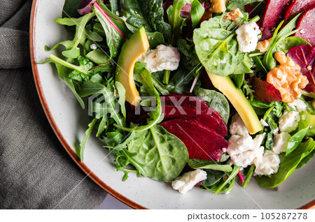 Green Salad with Beetroot, Feta Cheese, Walnuts Green Salad with Beetroot, Feta Cheese, Walnuts 105287278