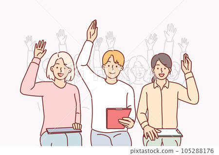Group of people raise hands sitting in conference room and participating in business training 105288176